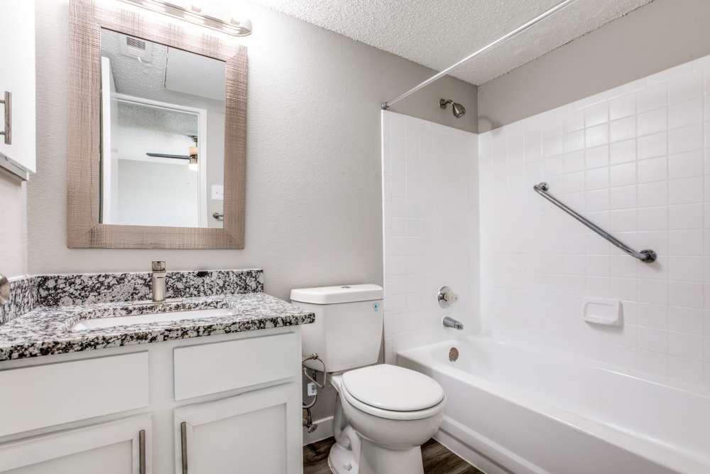 Bright bathroom with bathtub at Villa De Oro in San Antonio, Texas