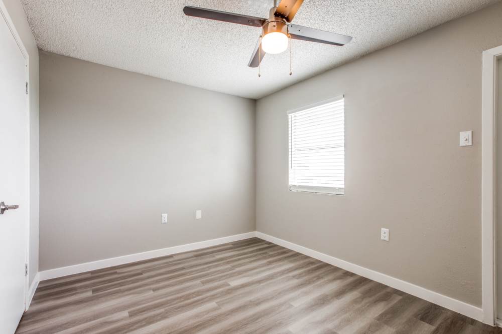 Unfurnished bedroom with natural light coming from window at Villa De Oro in San Antonio, Texas