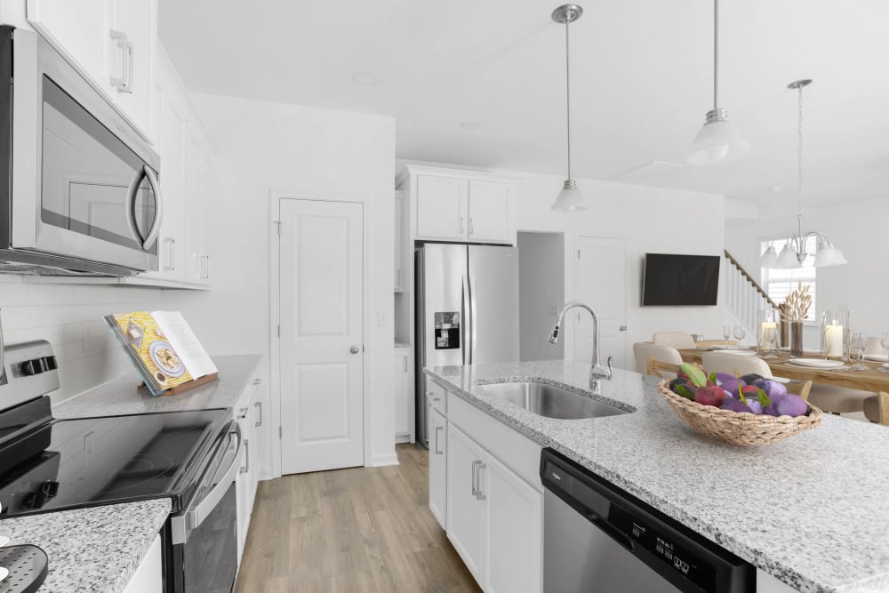 Full kitchen with stainless steel appliances at Baldwin Chase in Simpsonville, South Carolina