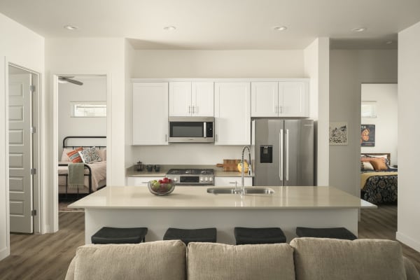 Luxury kitchen and living room at Sobremesa Villas in Surprise, Arizona