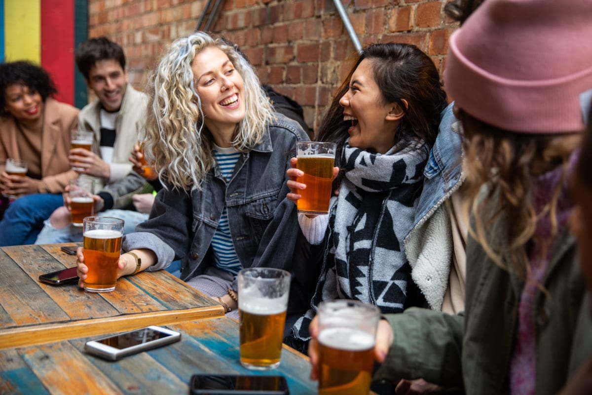 Residents enjoying a drink near The Square at Lawrenceville in Lawrenceville, Georgia