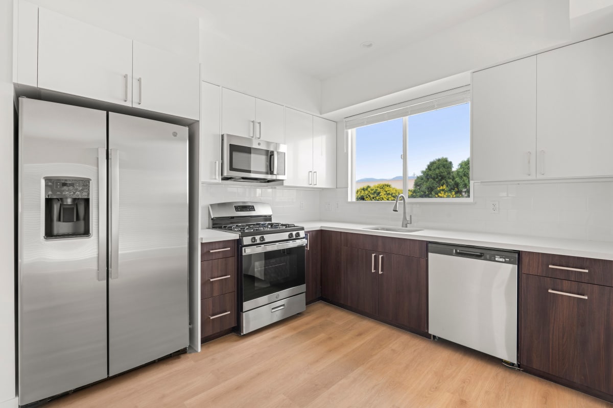 Modern kitchen with stainless-steel appliances at Reserve at Chino Hills, Chino Hills, California