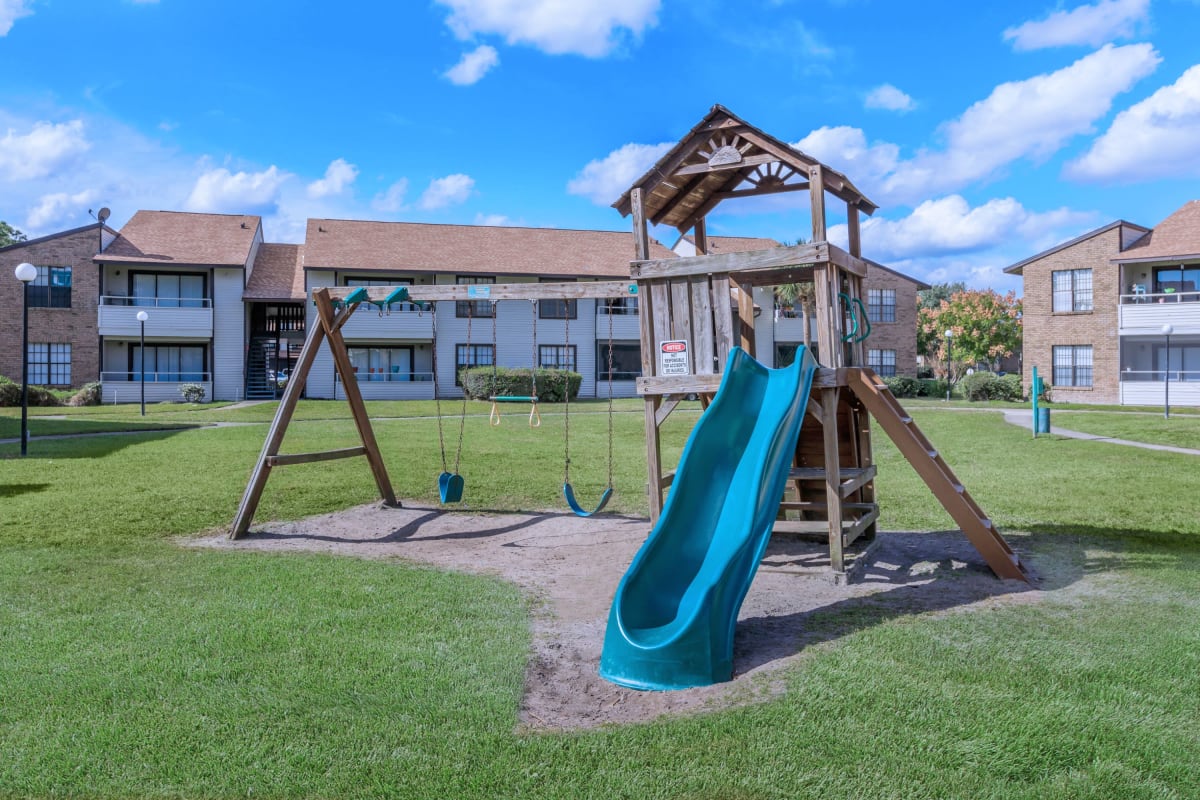 View amenities like our playground at Millenium Cove in Orlando, Florida