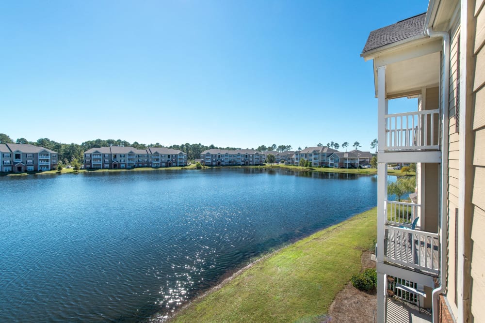 Balconies with beautiful views of the lake at Odyssey Lake in Brunswick, Georgia