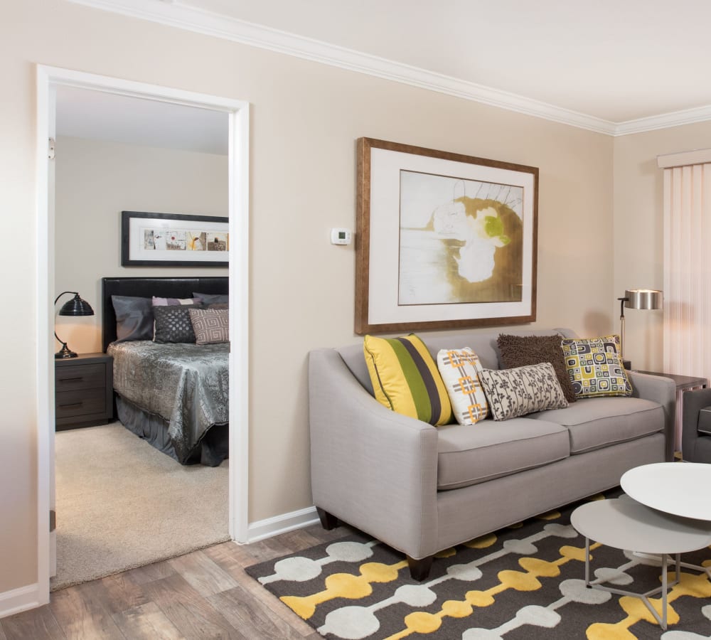 Living room with wood-style flooring at Shadow Ridge Apartment Homes in Simi Valley, California