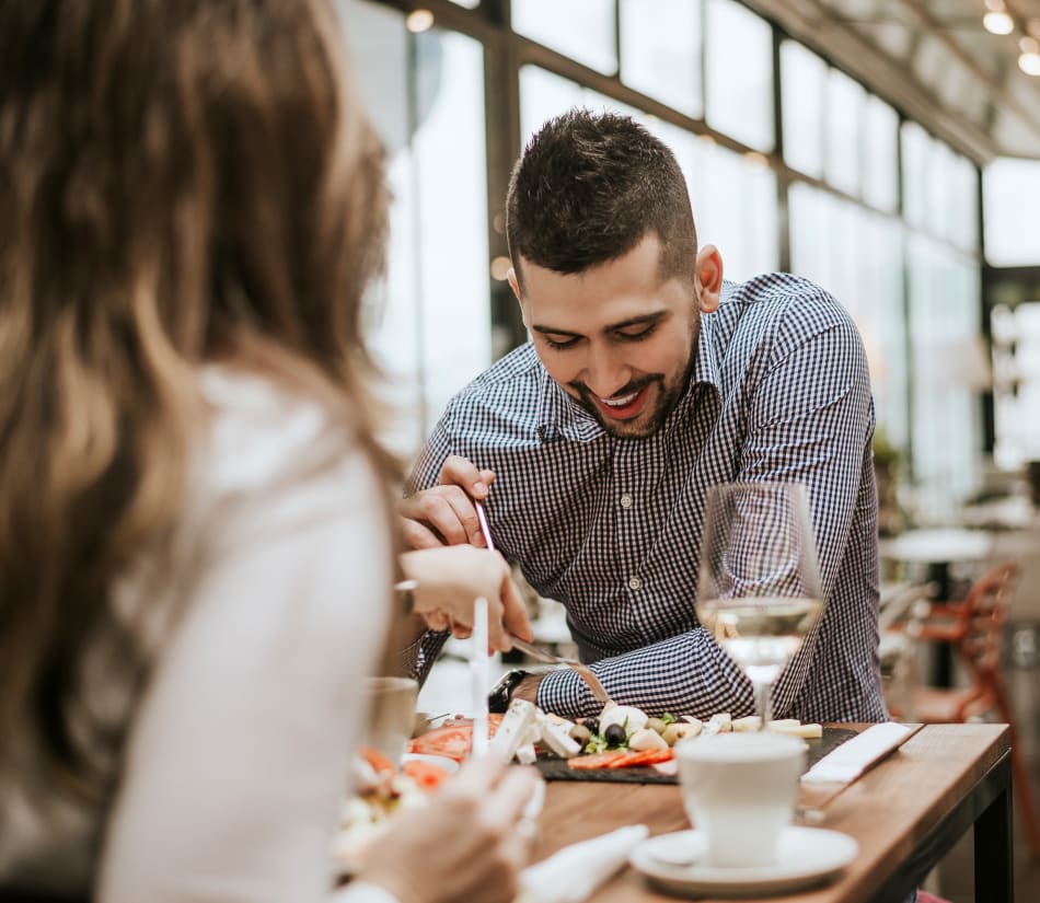 Resident couple out for a meal on date night near Sofi Westview in San Diego, California