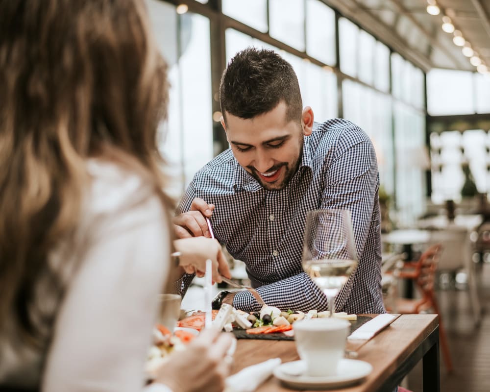 Resident couple out for a meal on date night near The Villas at Woodland Hills in Woodland Hills, California