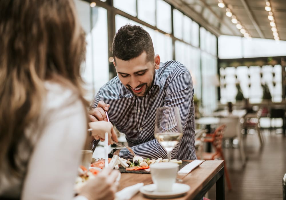 Resident couple dining out near Sofi Highlands in San Diego, California