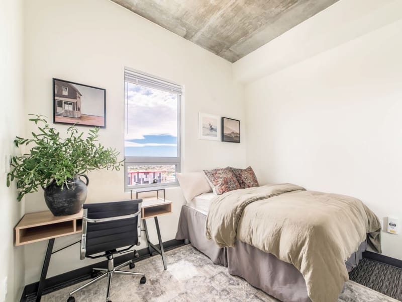 Model bedroom with soft carpet at The Pacific and Malibu in Tucson, Arizona