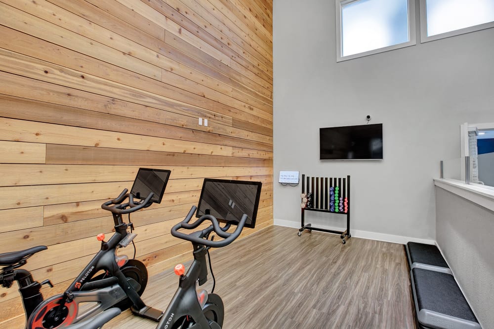 Fitness center with plenty of individual workout stations at Waters Edge Apartments in Kent, Washington