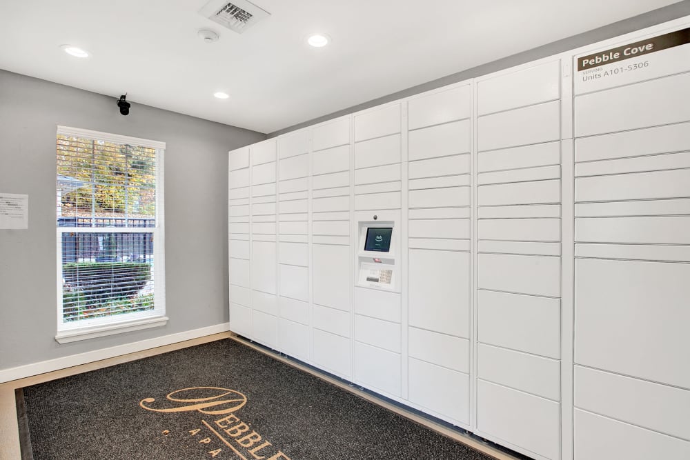 The convenient package room at Pebble Cove Apartments in Renton, Washington