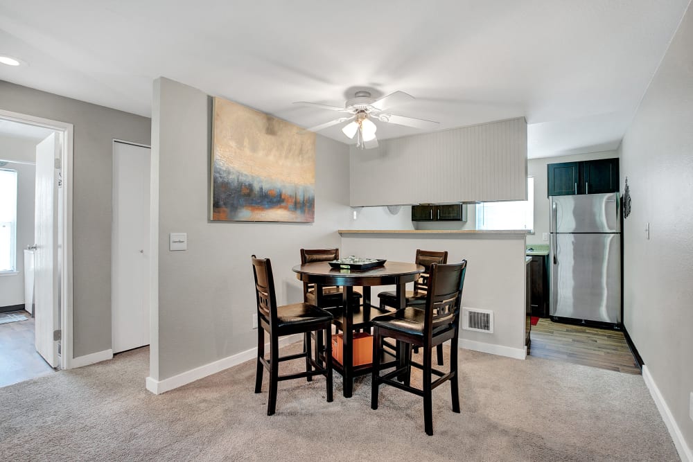 An open dining room at Waters Edge Apartments in Kent, Washington