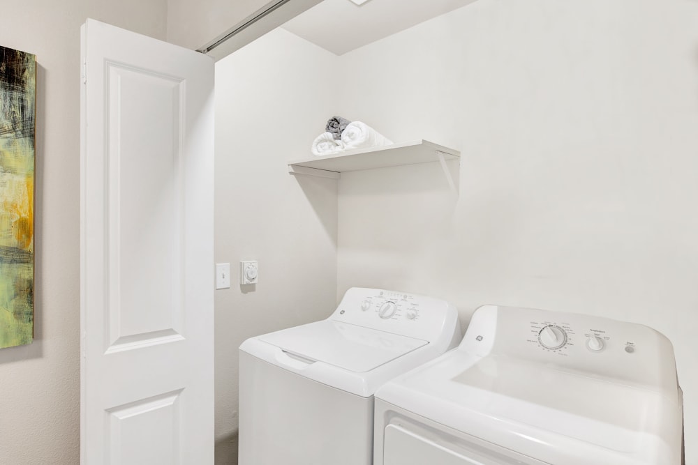 Apartments complete with a washer and dryer at Pebble Cove Apartments in Renton, Washington