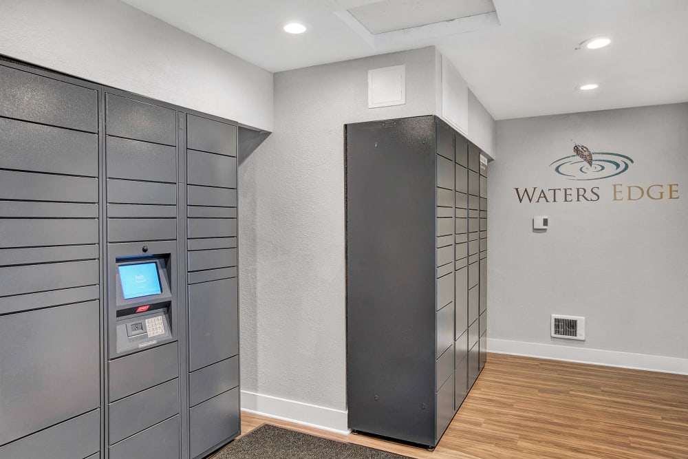 The convenient package room at Waters Edge Apartments in Kent, Washington