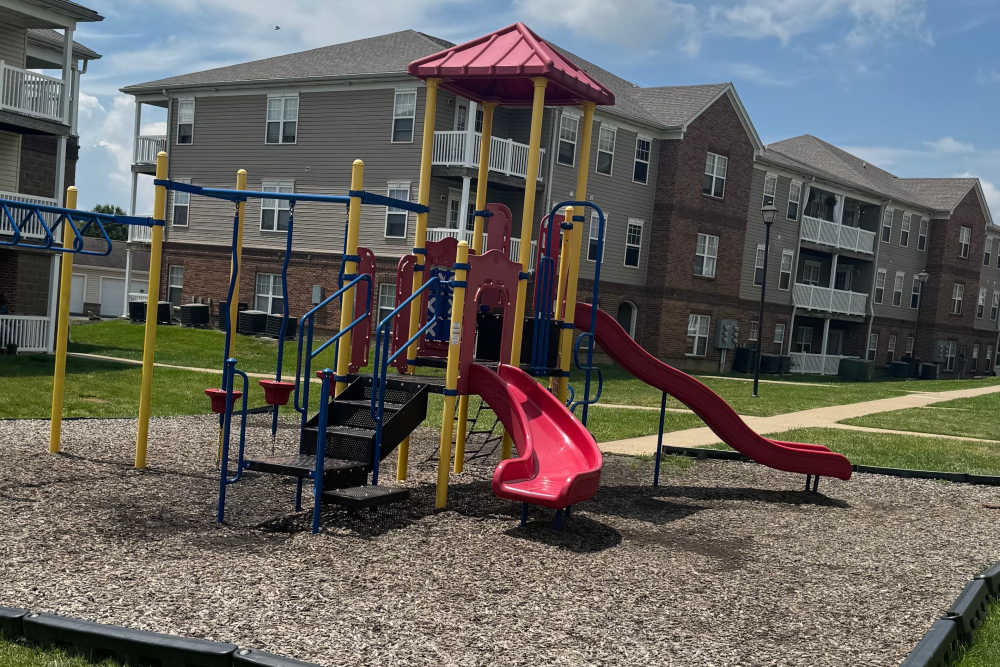Playground with red slides at Gleneagles Apartments in Lexington,Kentucky