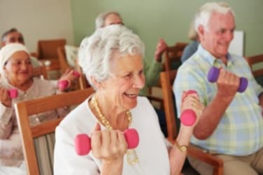 Residents Working Out at Grand Villa of Englewood in Englewood, Florida