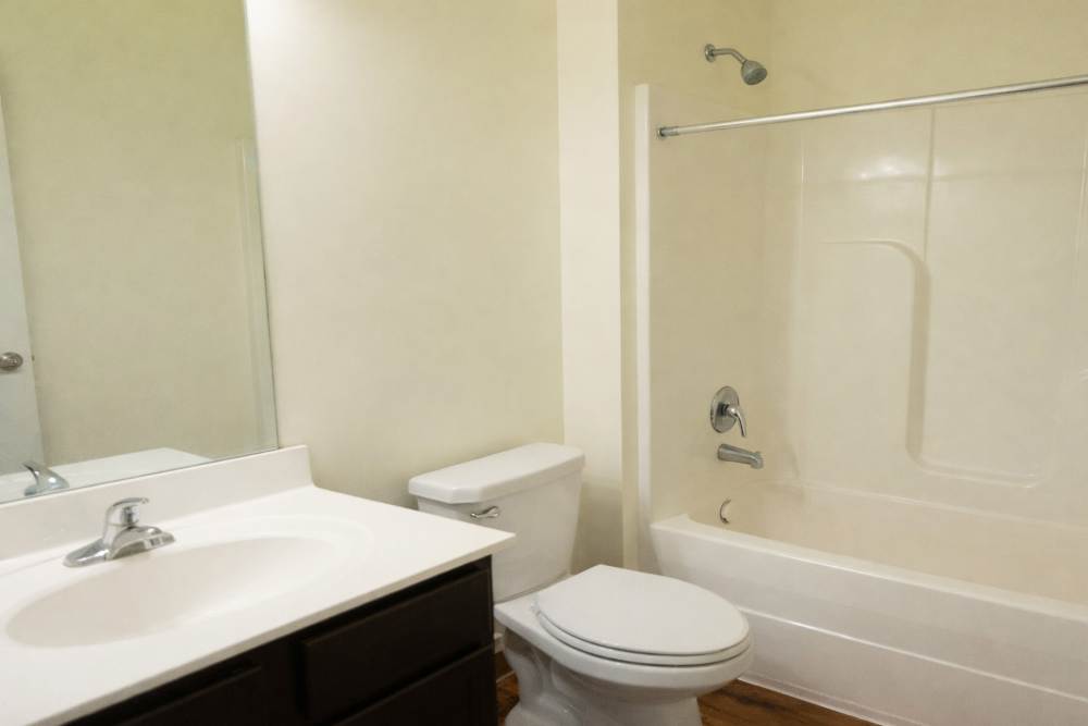 Bathroom showing a bath tub at Fairway Breeze in El Reno. OK