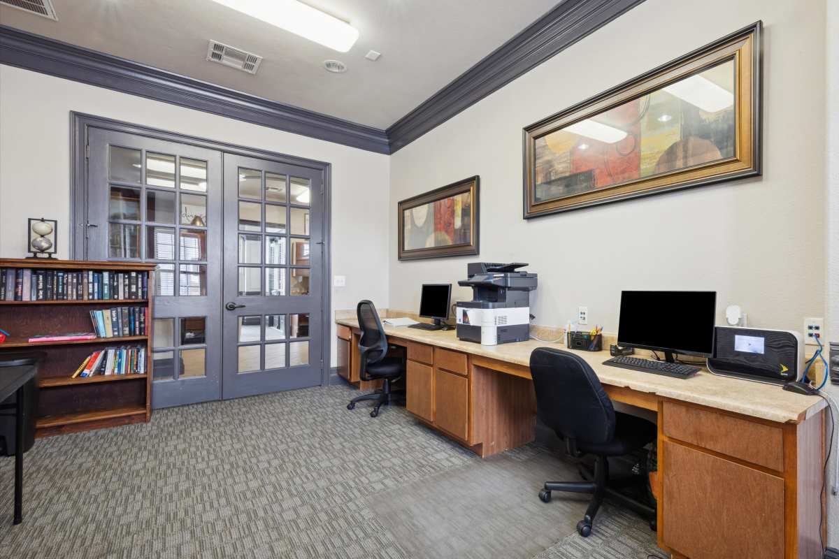 Business center with computers at Lansbourough in Houston, Texas
