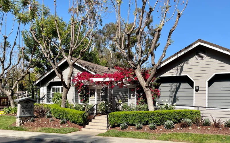 The sign and stairs to the leasing office at Village Oaks in Chino Hills, California