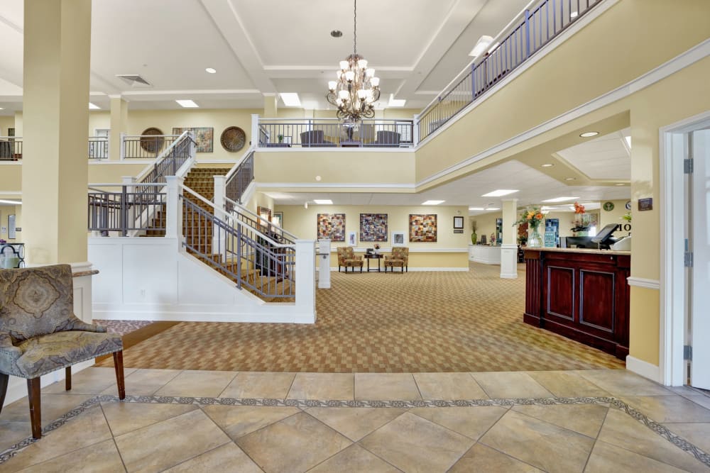 Front door entrance with reception and large stairway at The Commons at Union Ranch in Manteca, California