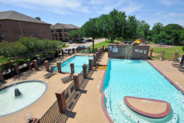 Aerial view of luxury swimming pool at Carrollton Park of North Dallas in Dallas, Texas