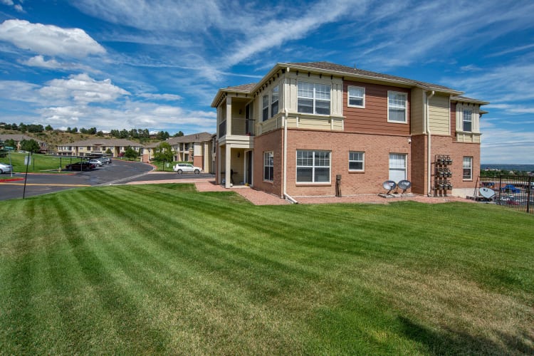 Exterior view of the apartments at Retreat at Cheyenne Mountain Apartments
