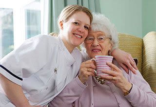 Senior living resident with nurse in New Orleans