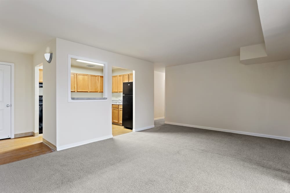 Spacious living room and kitchen area at Creekside Village in Alexandria, Virginia