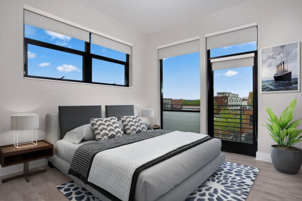 Spacious bedroom with plank flooring at Arcade Sunshine in Washington, District of Columbia