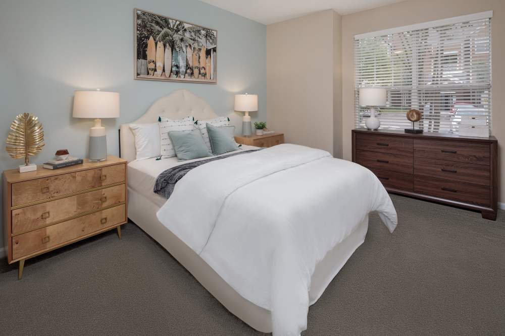 Charming bedroom with soft pastel walls and elegant furnishings at Bryant at Summerville in Summerville, South Carolina.