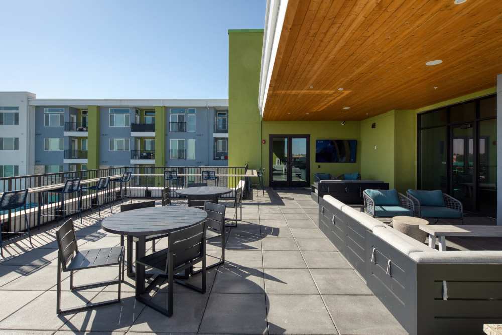 Outdoor seating area at Zeta Luxury Apartments in Sacramento, California