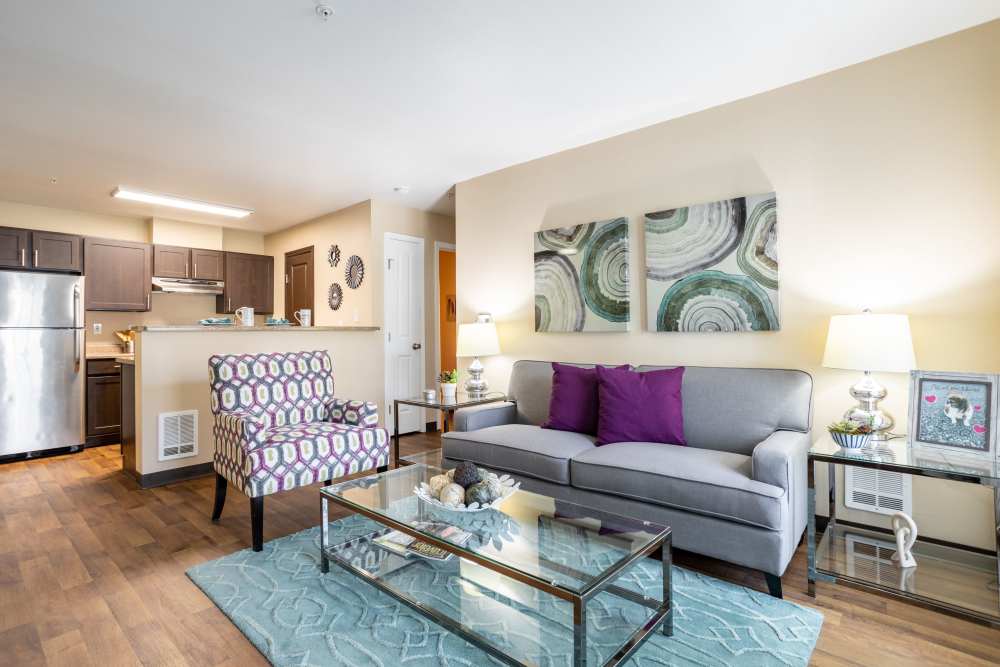 Decorated living room at Pebble Cove Apartments in Renton, Washington