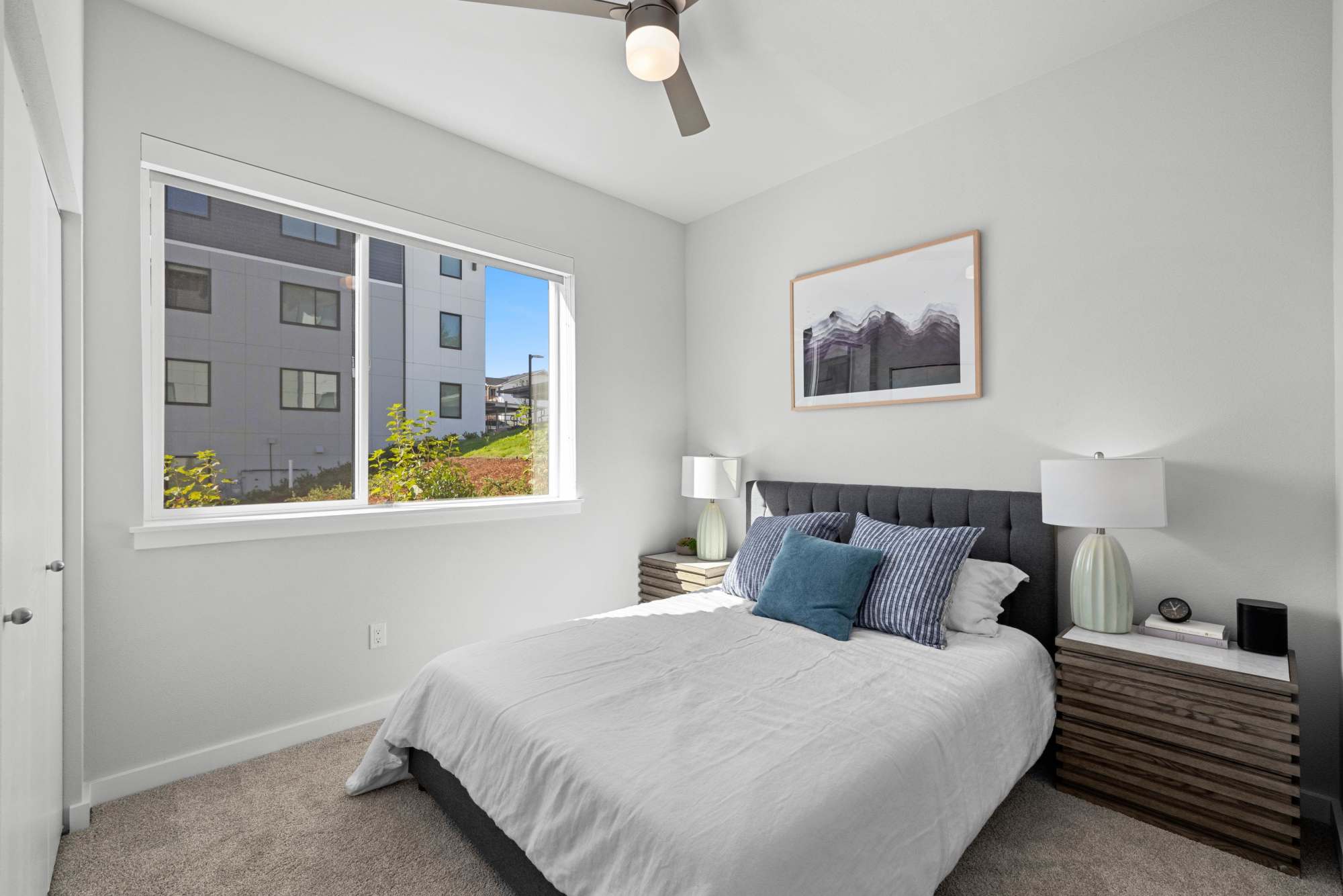 Bedroom with carpet flooring at The Highlands at Silverdale in Silverdale, Washington