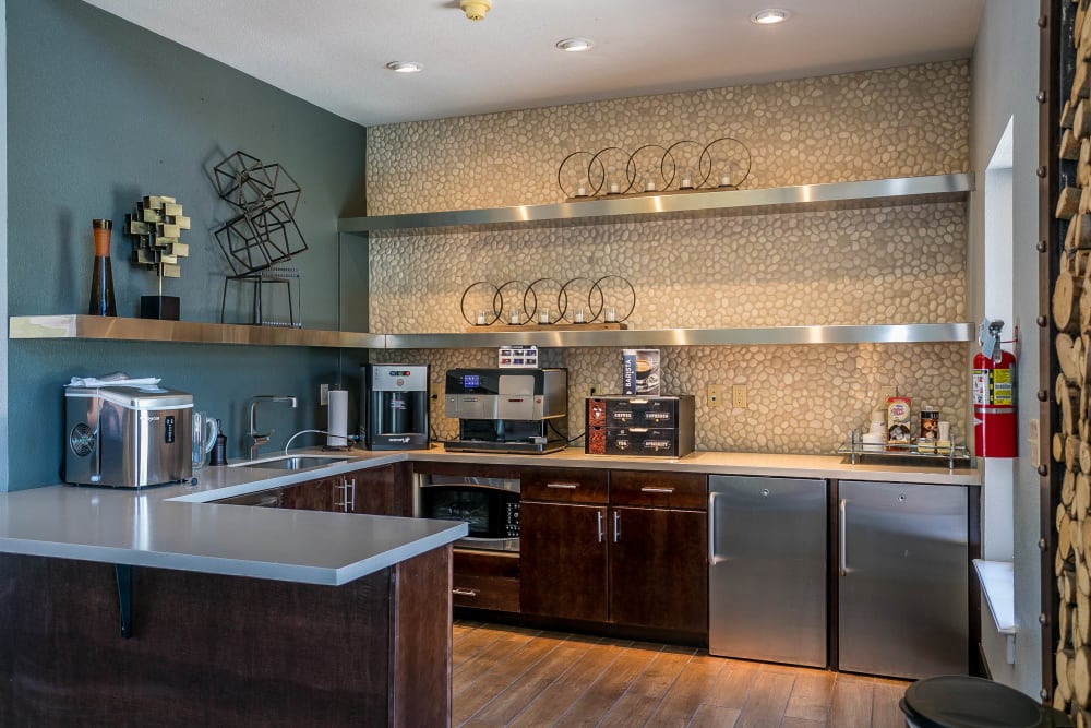 The well appointed community kitchen at The Crossings at Bear Creek Apartments in Lakewood, Colorado