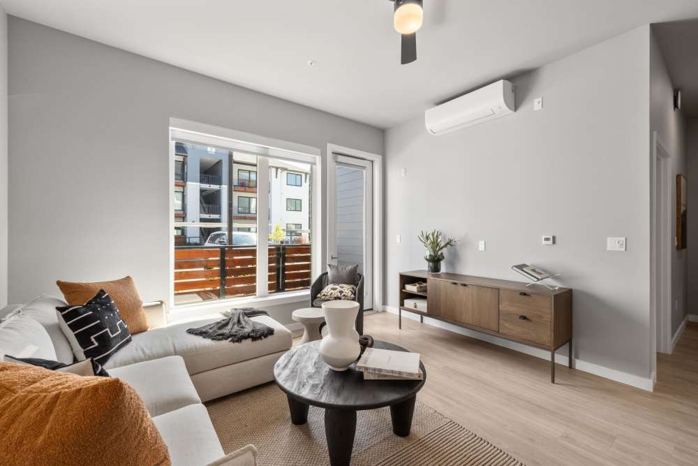 Living room with air condition at The Highlands at Silverdale in Silverdale, Washington