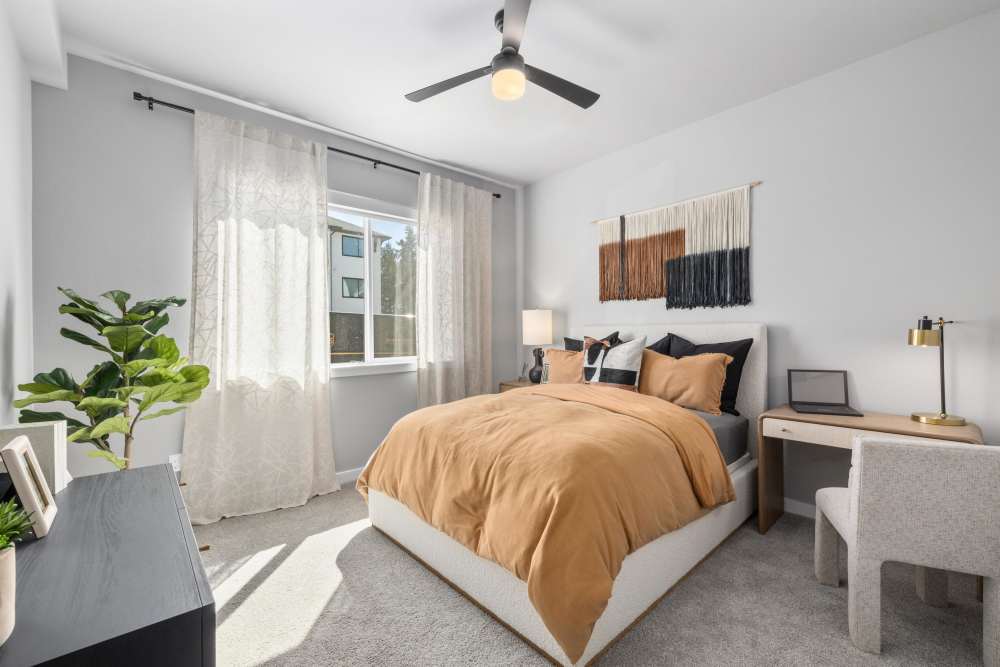 Bedroom with computer desk at The Highlands at Silverdale in Silverdale, Washington