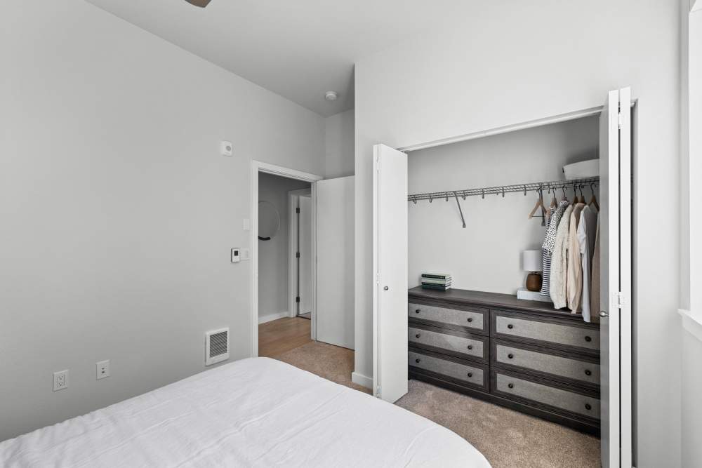 Bedroom with attached closet at The Highlands at Silverdale in Silverdale, Washington