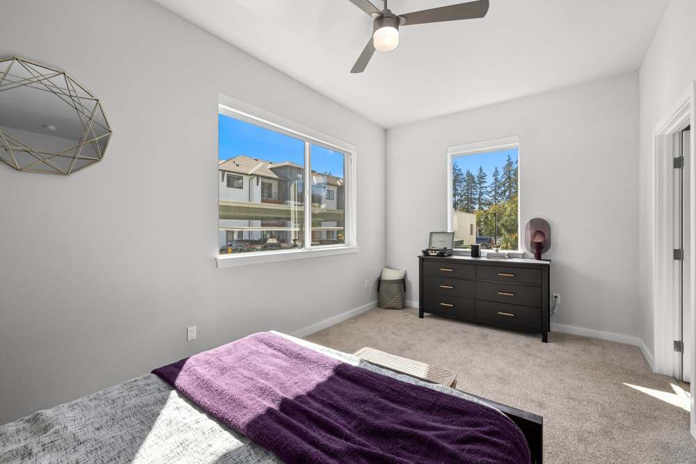 Bedroom with large window at The Highlands at Silverdale in Silverdale, Washington