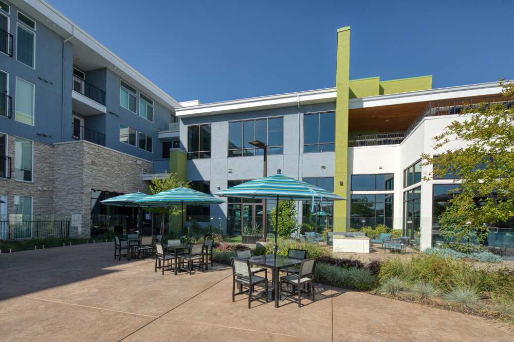 Outdoor seating spaces at Zeta Luxury Apartments in Sacramento, California