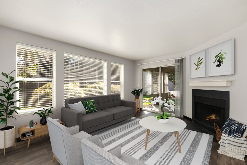 Well-decorated living room with wood-style flooring at Meadows at Cascade Park Apartments in Vancouver, Washington