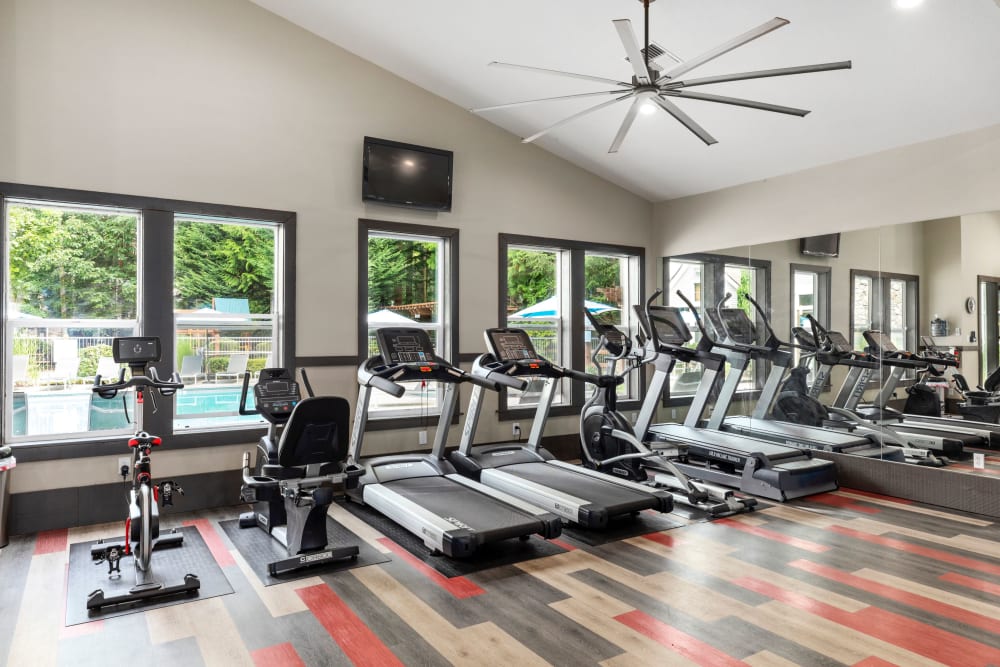 Fitness center with plenty of individual workout stations at Wildreed Apartments in Everett, Washington