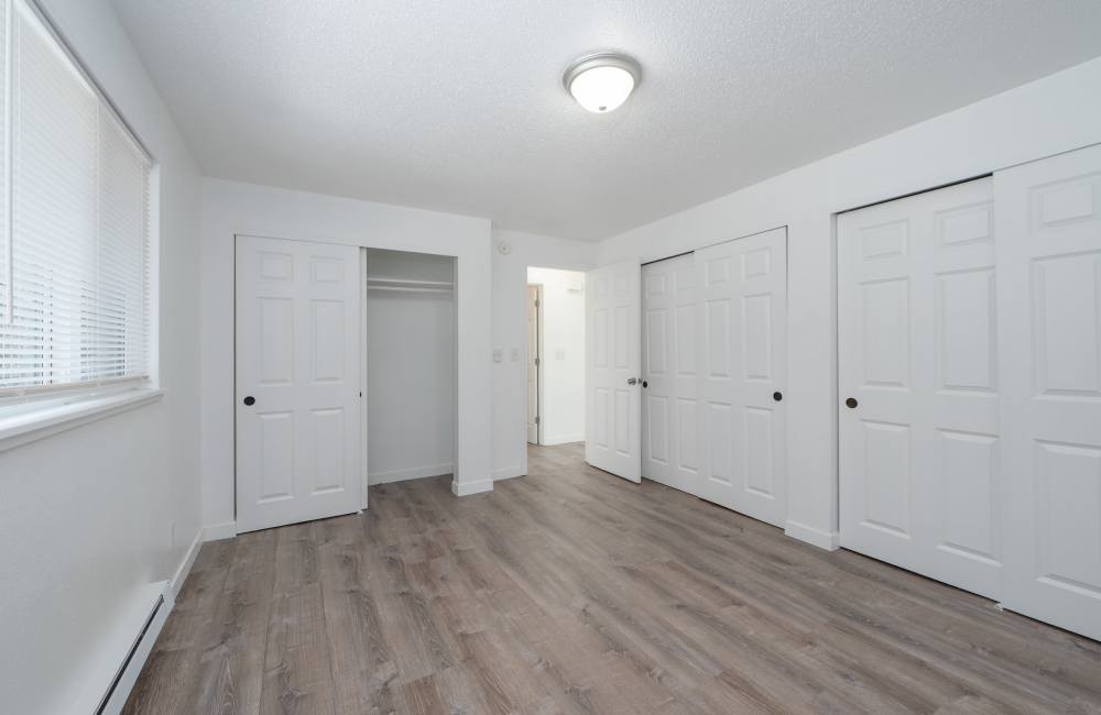 Bedroom with spacious closet at The Sage Collection in Tacoma, Washington