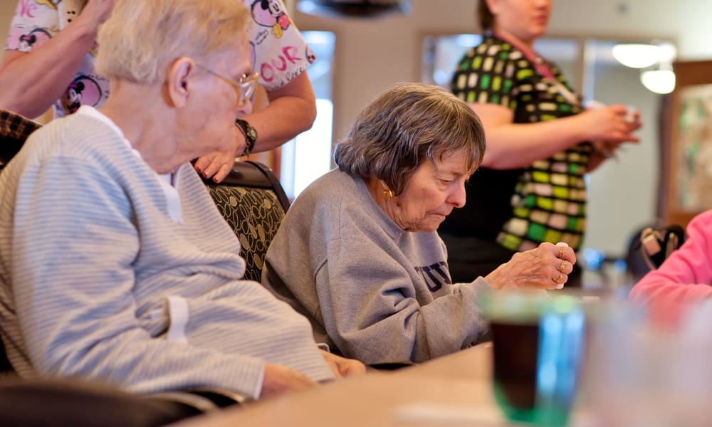 Resident working on art projects as a group at Fair Oaks Health Care Center in Crystal Lake, Illinois