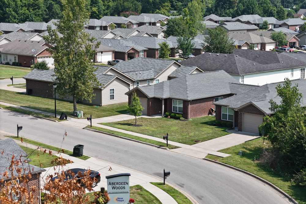 Charming suburban neighborhood with well-maintained homes and greenery at Aberdeen Woods in Jeffersonville, Indiana