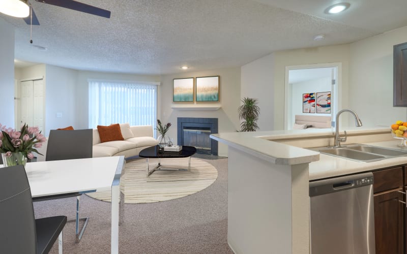 Spacious living room floor plan with a fireplace at Bluesky Landing Apartments in Lakewood, Colorado