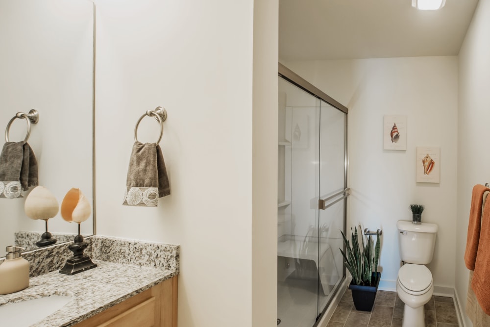 Bathroom with granite countertops at Lakewood Park Apartments in Lexington, Kentucky