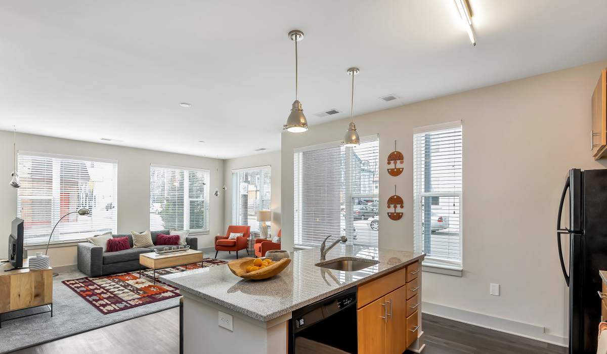 Spacious living room with windows at Gantry Apartments in Cincinnati, Ohio