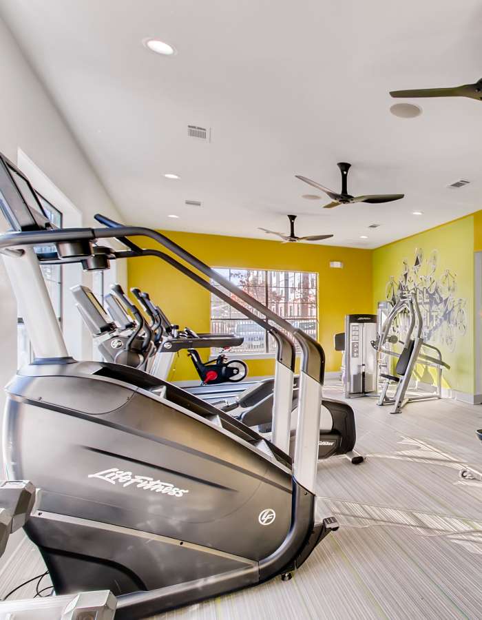 Well-equipped on-site fitness center at Midtown 905 in Denton, Texas