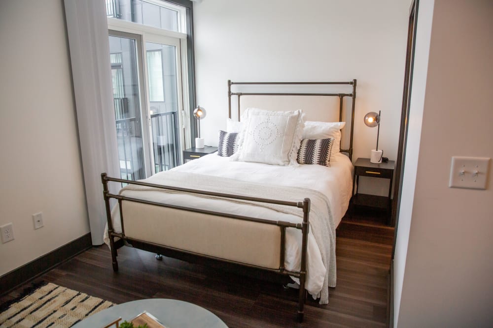 Bed area in a studio apartment at Belcourt Park in Nashville, Tennessee