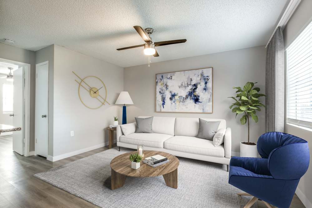 Living room with beautiful wall art at Villa De Oro in San Antonio, Texas